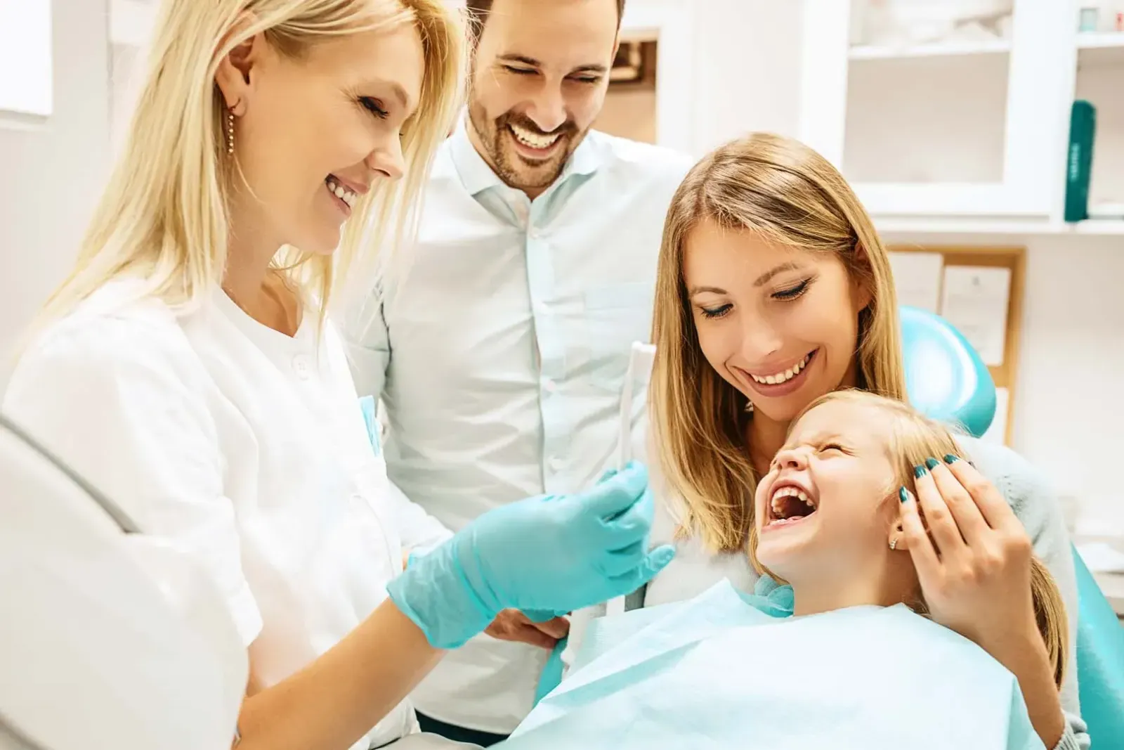 Smiling family after a visit to Refined Smiles in Cave Creek