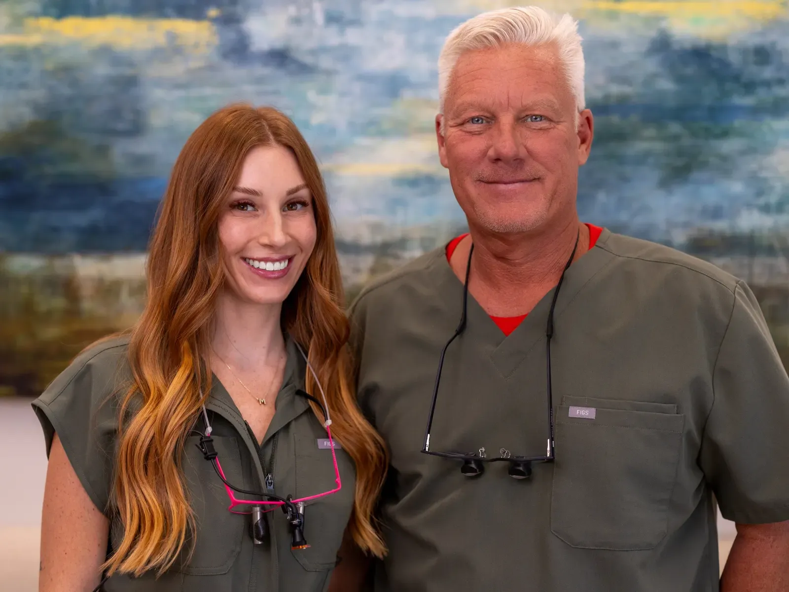 Dr. Kapers with her father outside the Refined Smiles practice